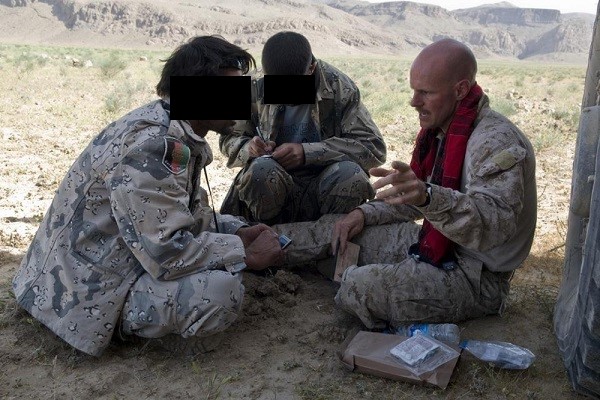 Advisor with Interpreter in Afghanistan. COMISAF Advisory and Assistance Team (CAAT).